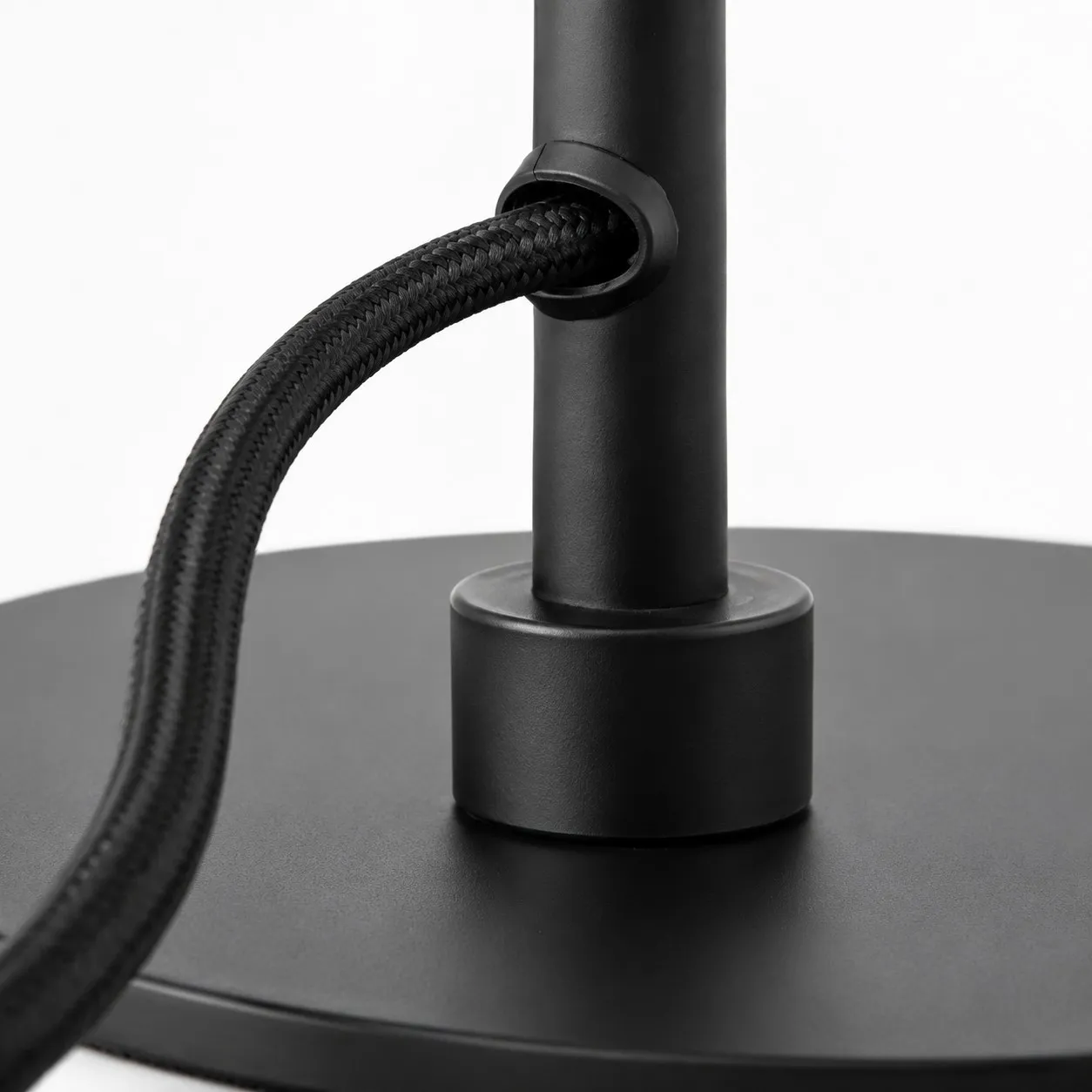 Black stem and round base