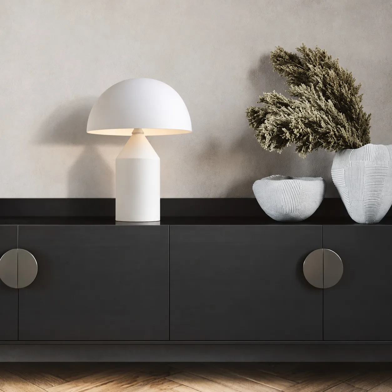 Matte white mushroom table lamp beside dried stems