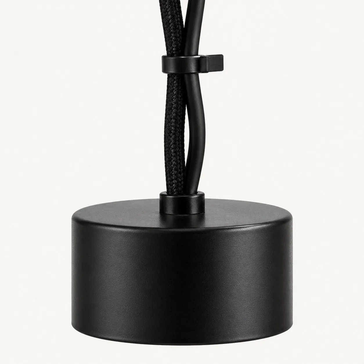 Black floor weight and cord