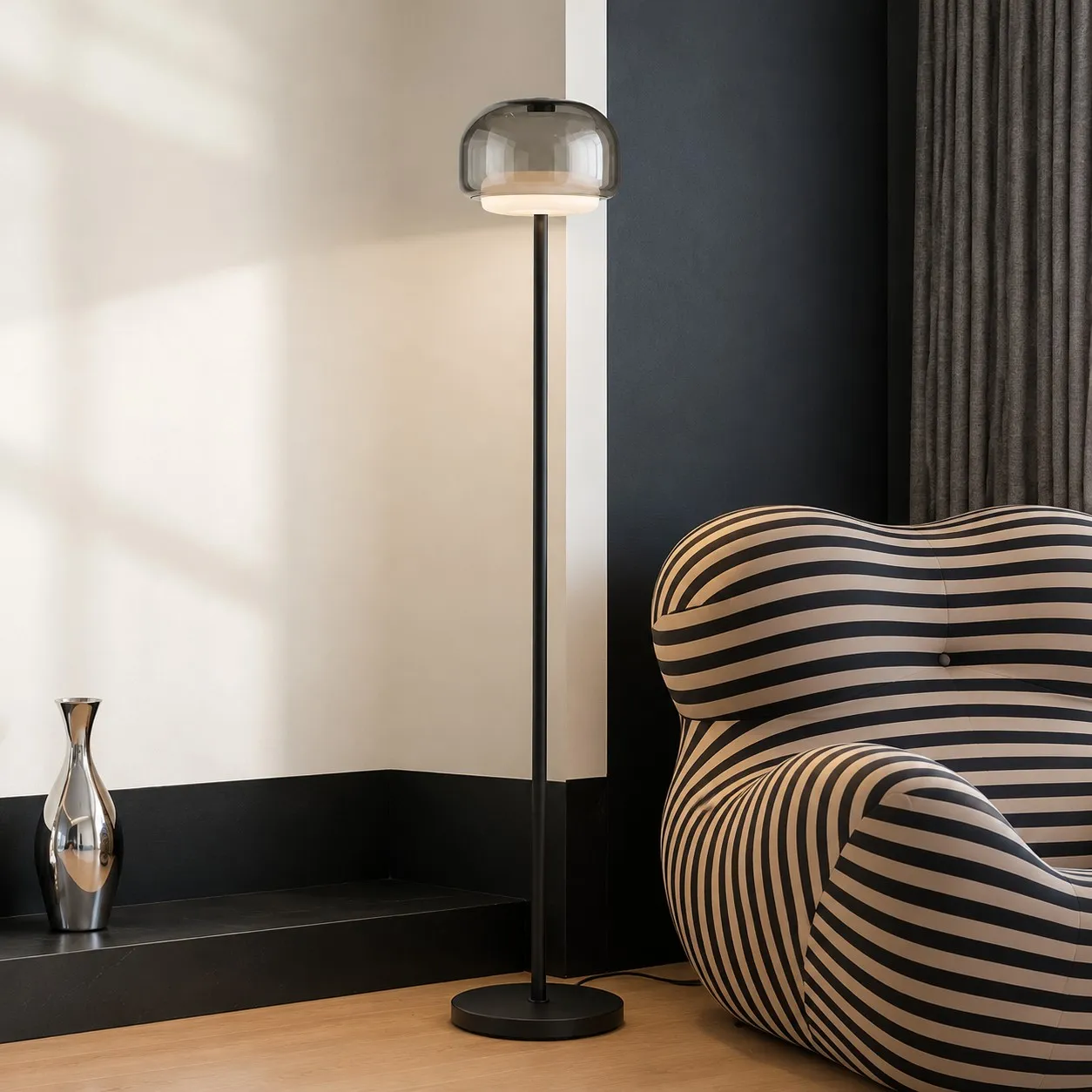 Smoke Gray floor lamp beside a striped chair