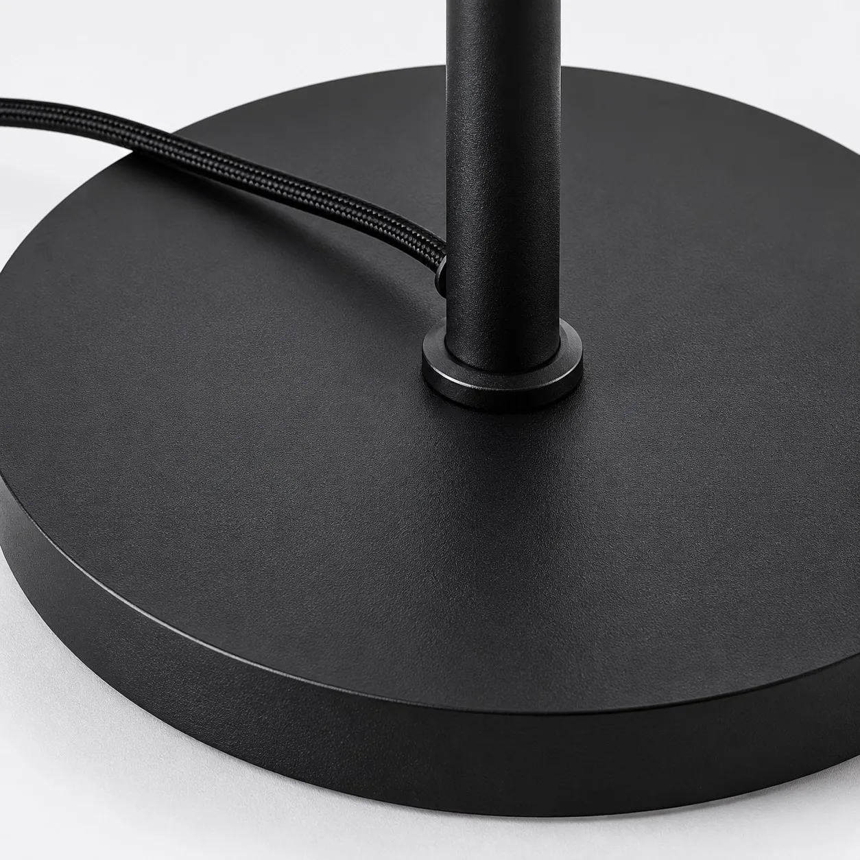 Black stem and round base