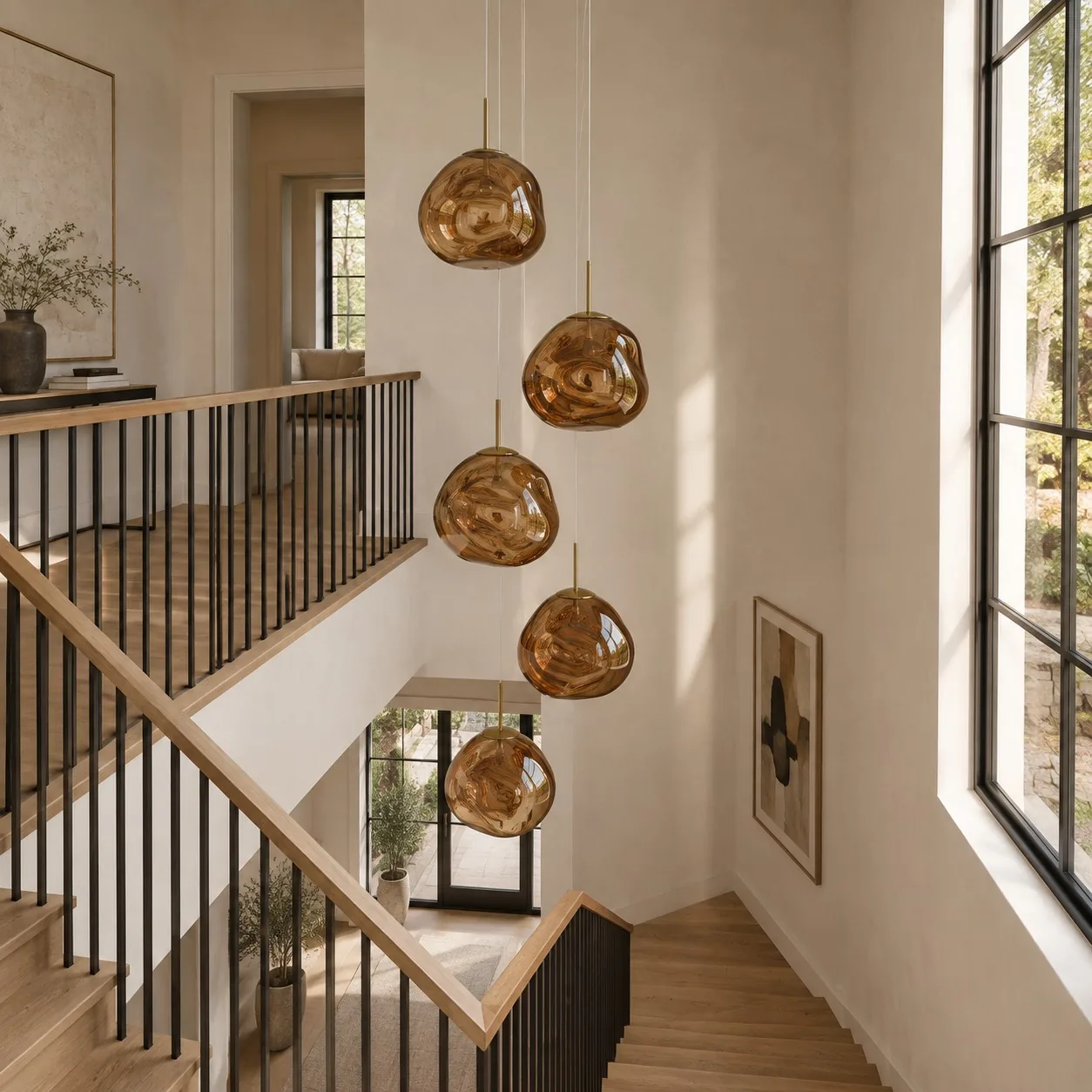 Gold pendant cluster in a stairwell