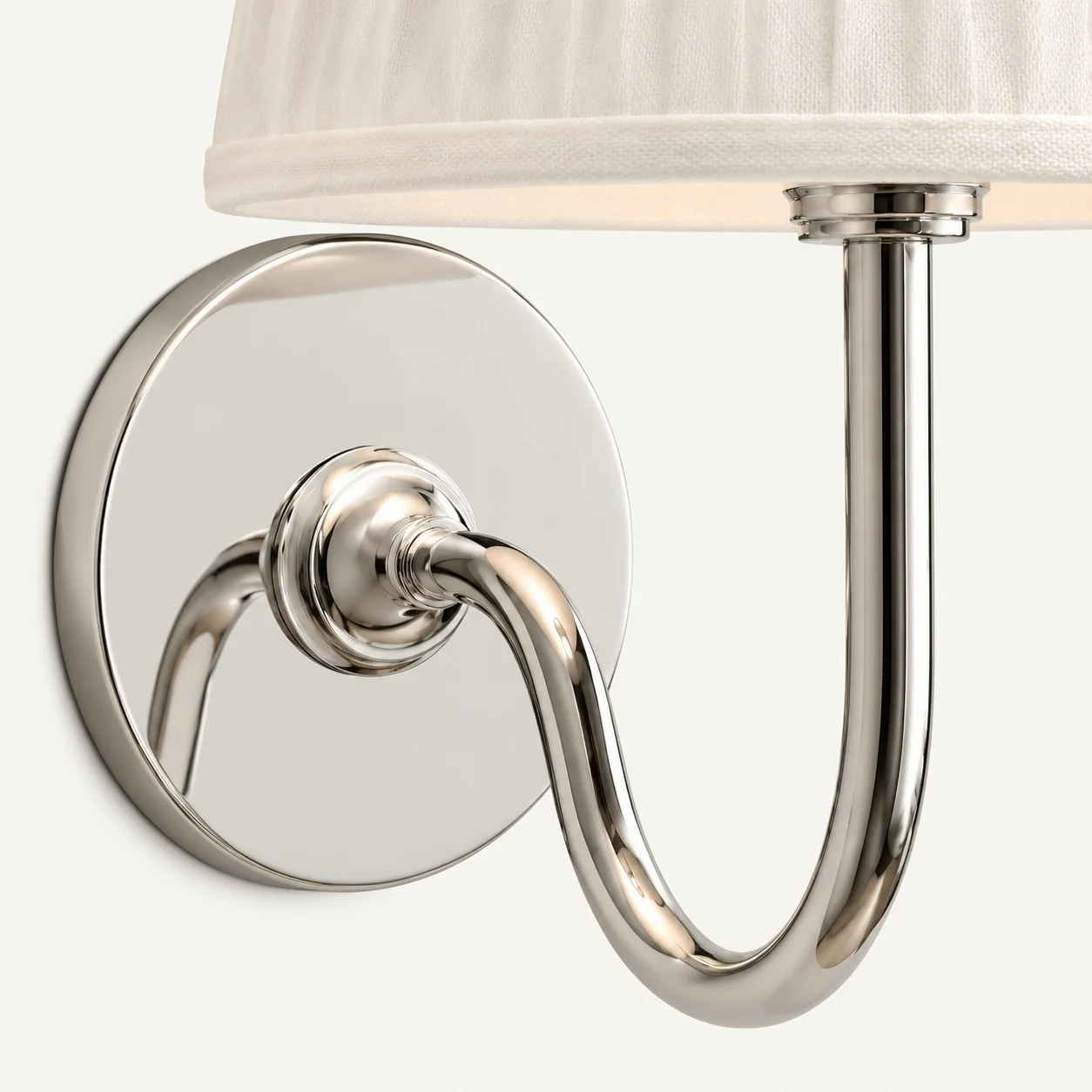 Polished chrome swan-neck arm and circular canopy