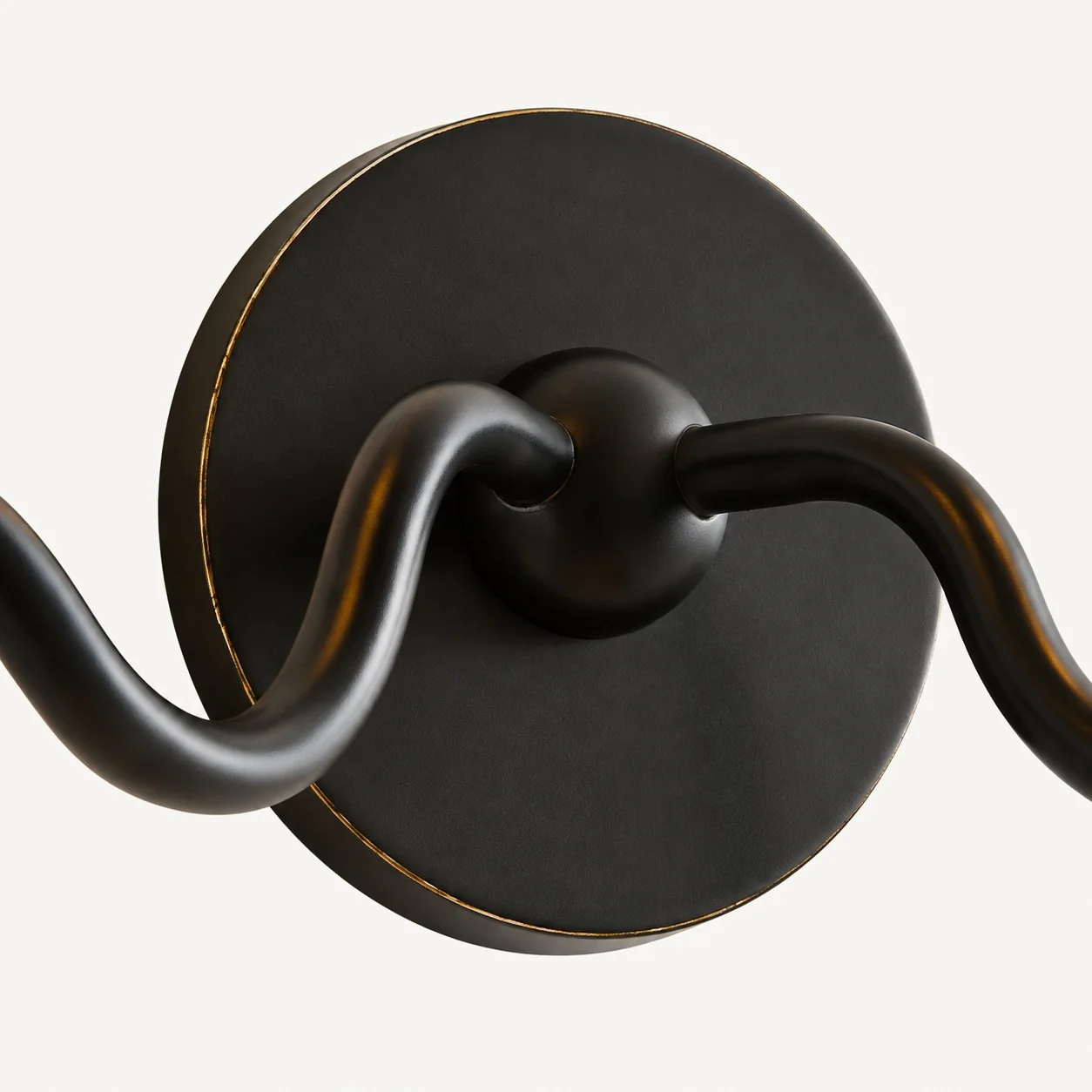 Matte black dual-arm canopy with gold-edged rim
