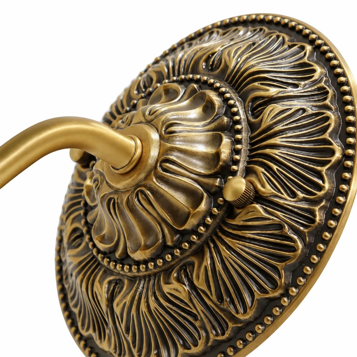 Ornate backplate with embossed leaf relief