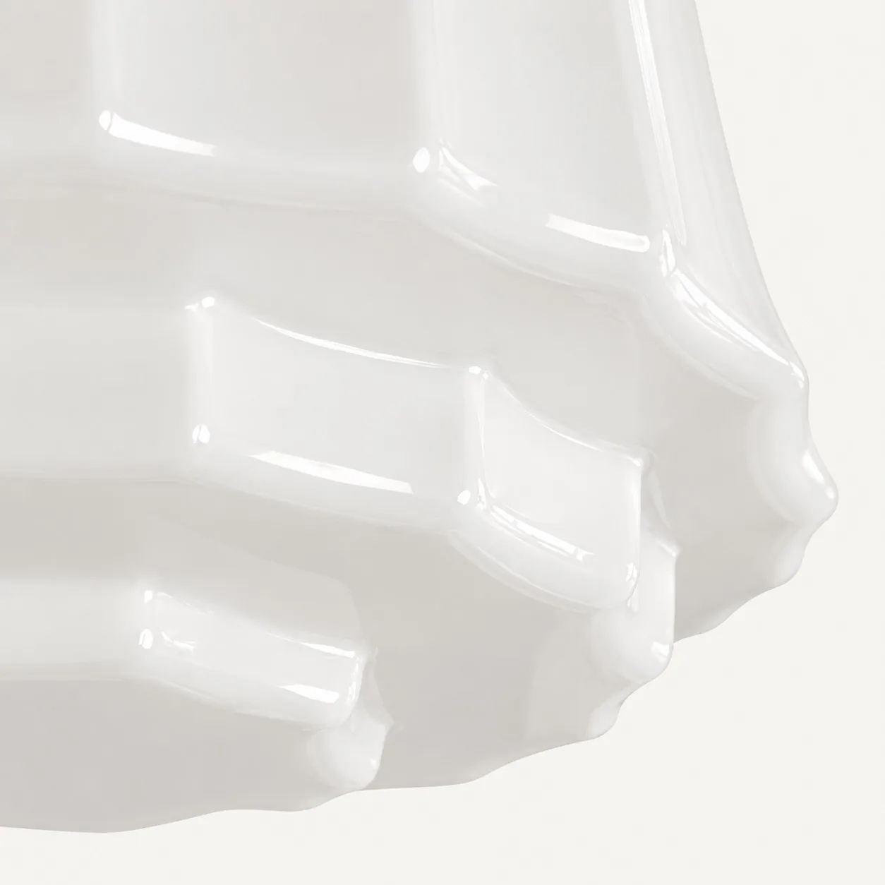 Close-up of Cascira glossy opal glass tiers
