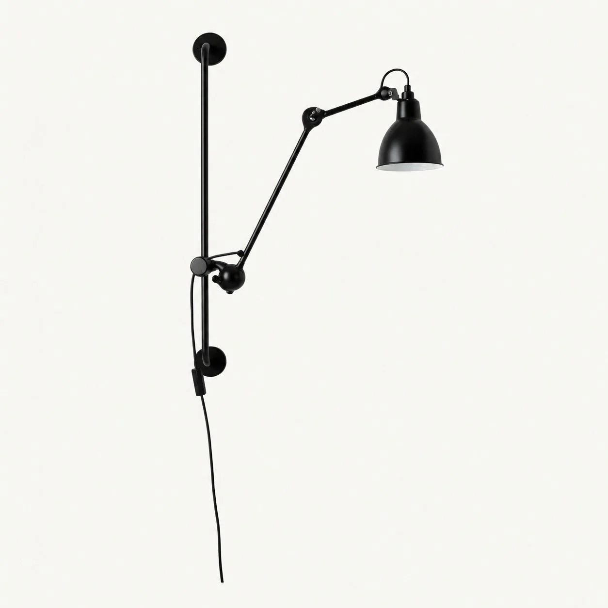 Articula Model E small wall light on a vertical rail