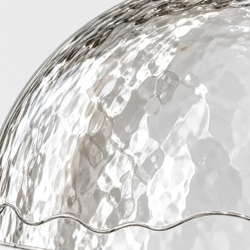 Hammered glass and the wavy hem of the dome pendant