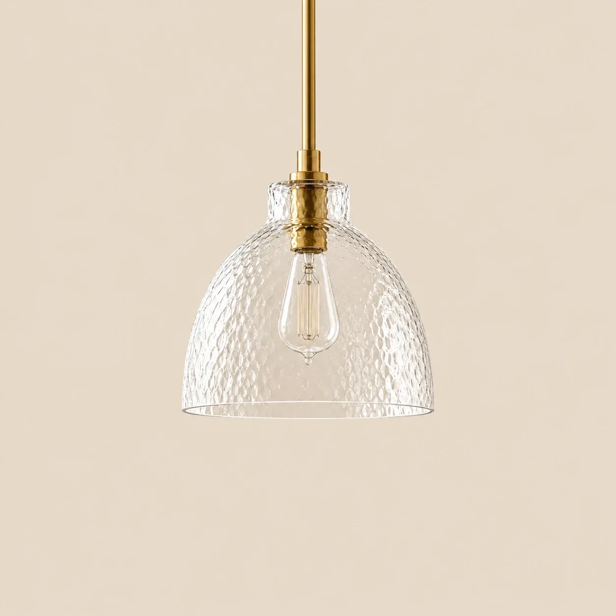 8 inch hammered glass bell pendant in Brass
