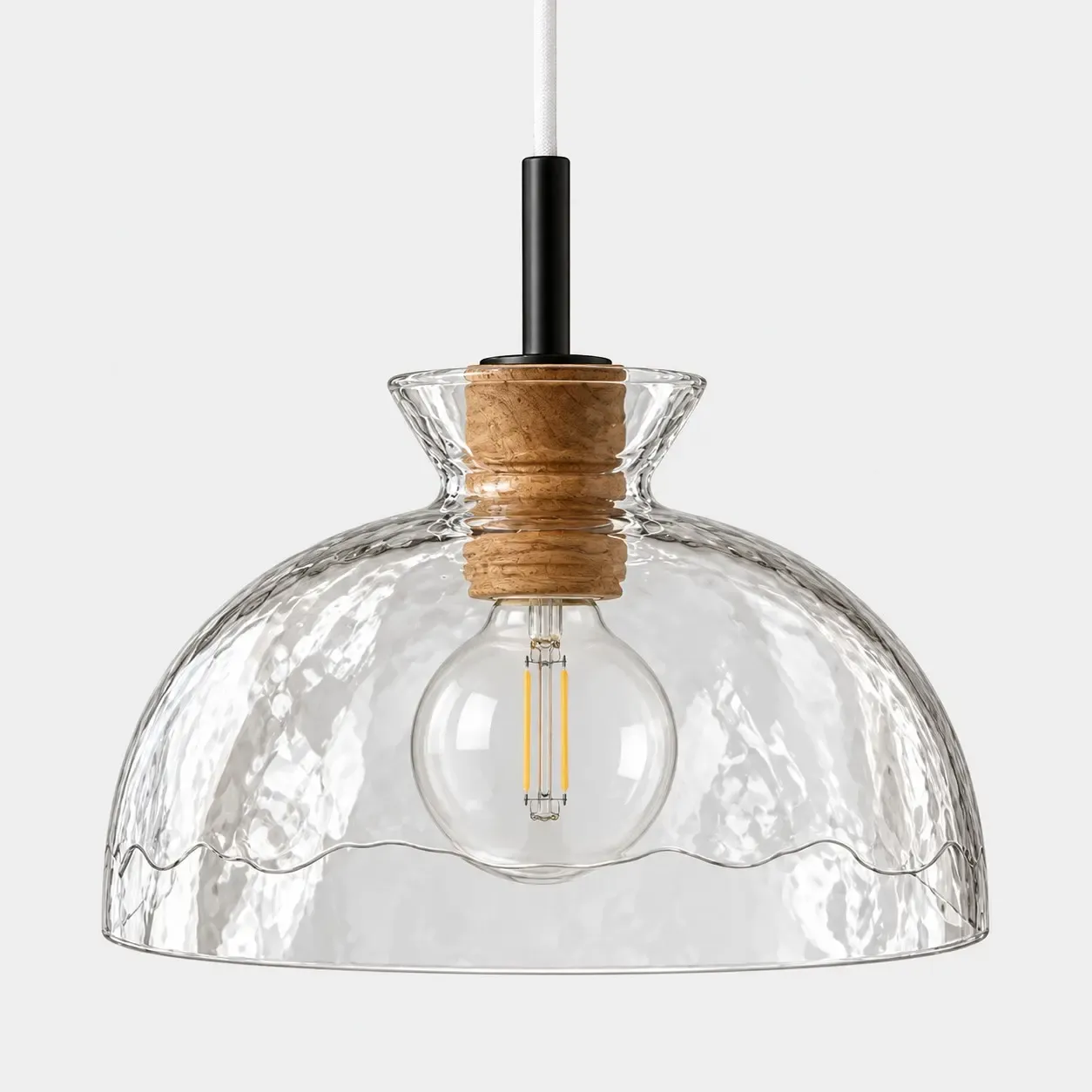 Scalloped hammered glass dome pendant with a cork collar and white cord