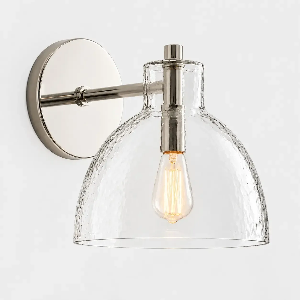 One hammered glass bell wall sconce in Polished Nickel