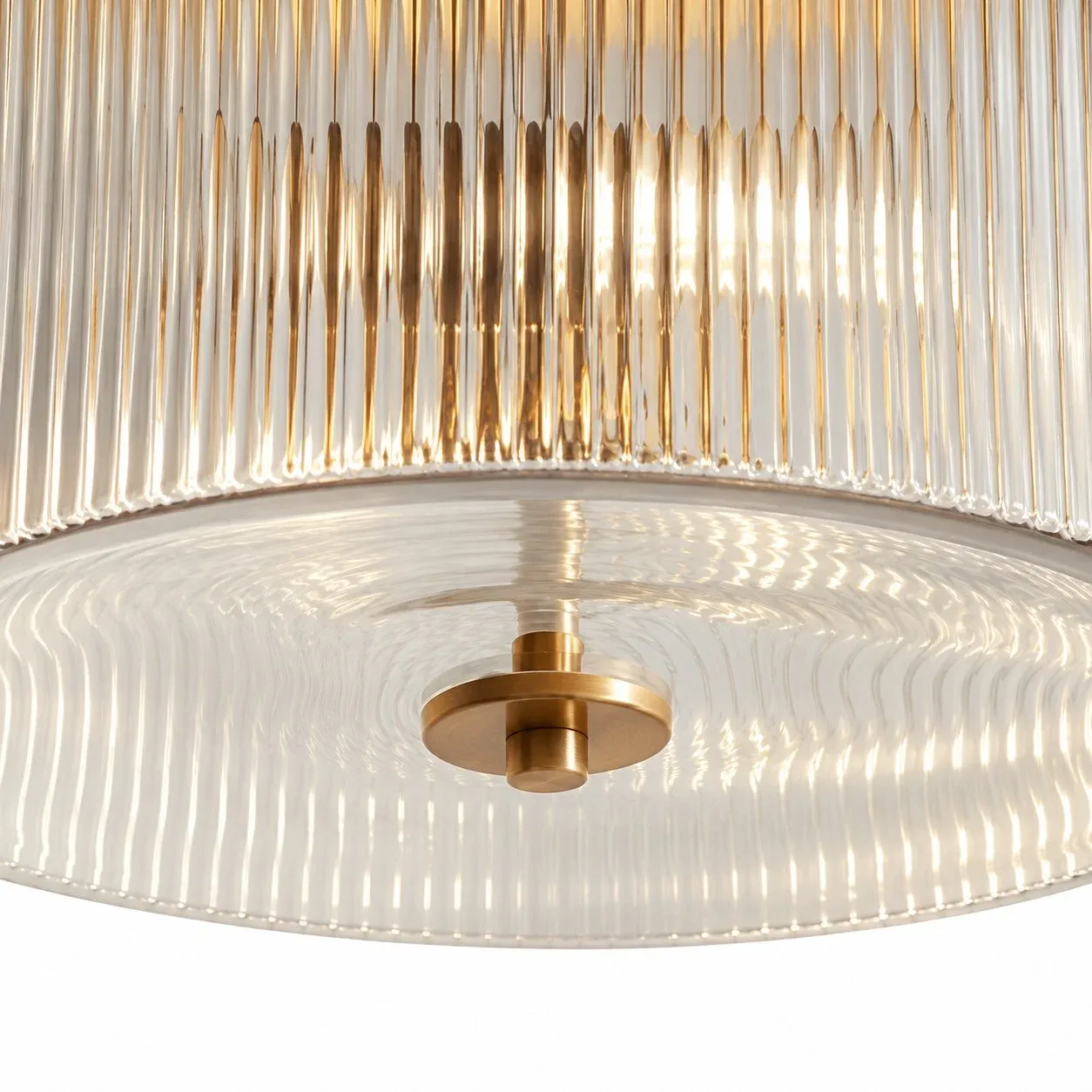 Wavy clear glass bottom with a small brass center fitting