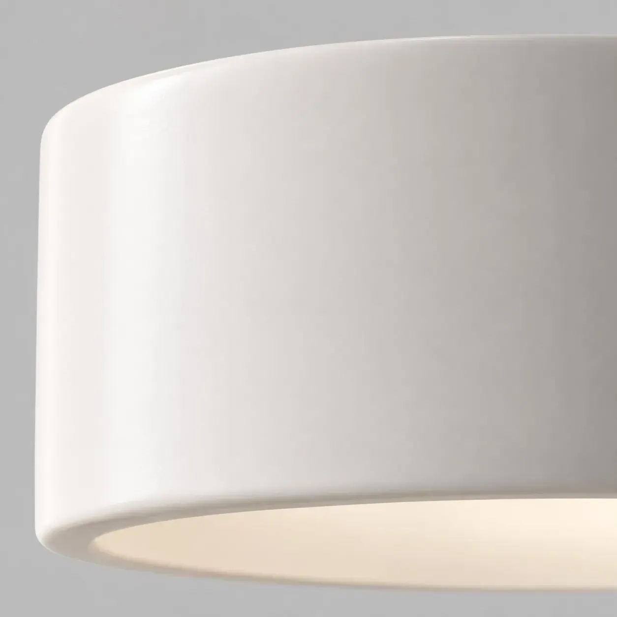 Close view of the thick white porcelain lip and the warm light inside the 14 inch drum