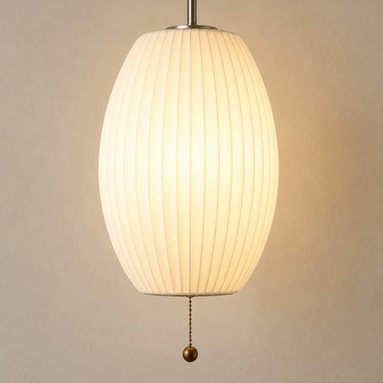 Oval ribbed shade with a bead pull chain and wood bead