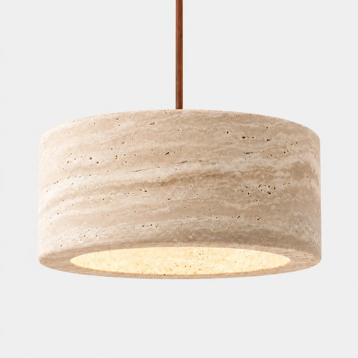 Close view of a large cylindrical travertine shade