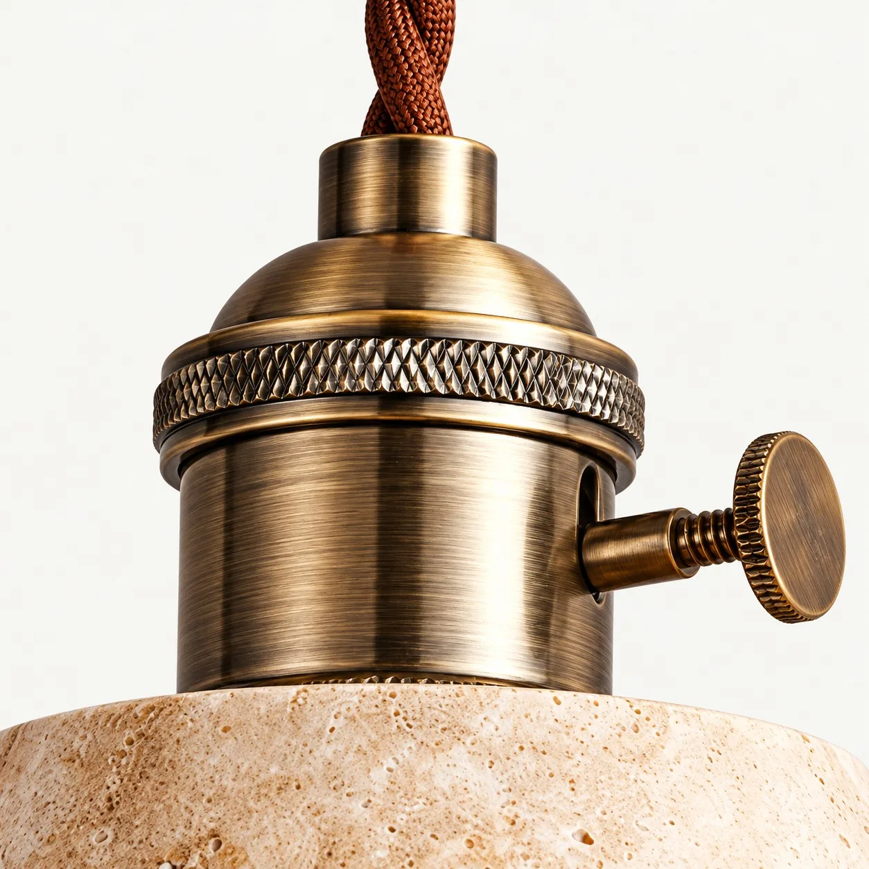 Brass-toned socket, side switch, and brown twisted cord