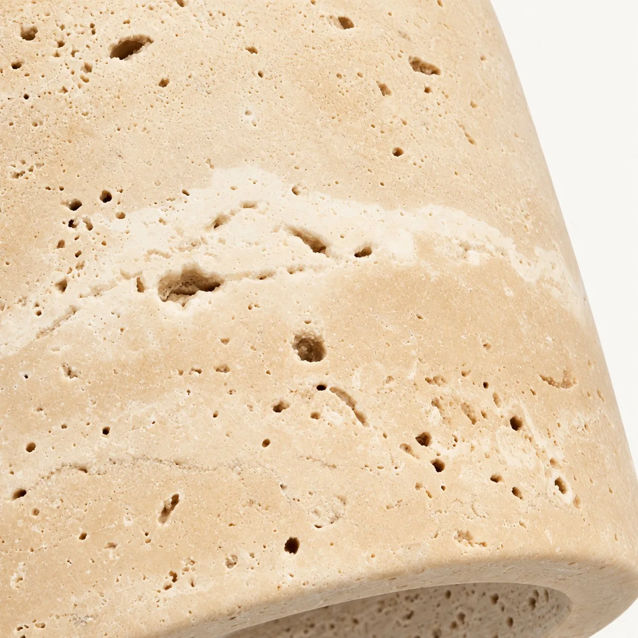 Close view of pores in the travertine shade