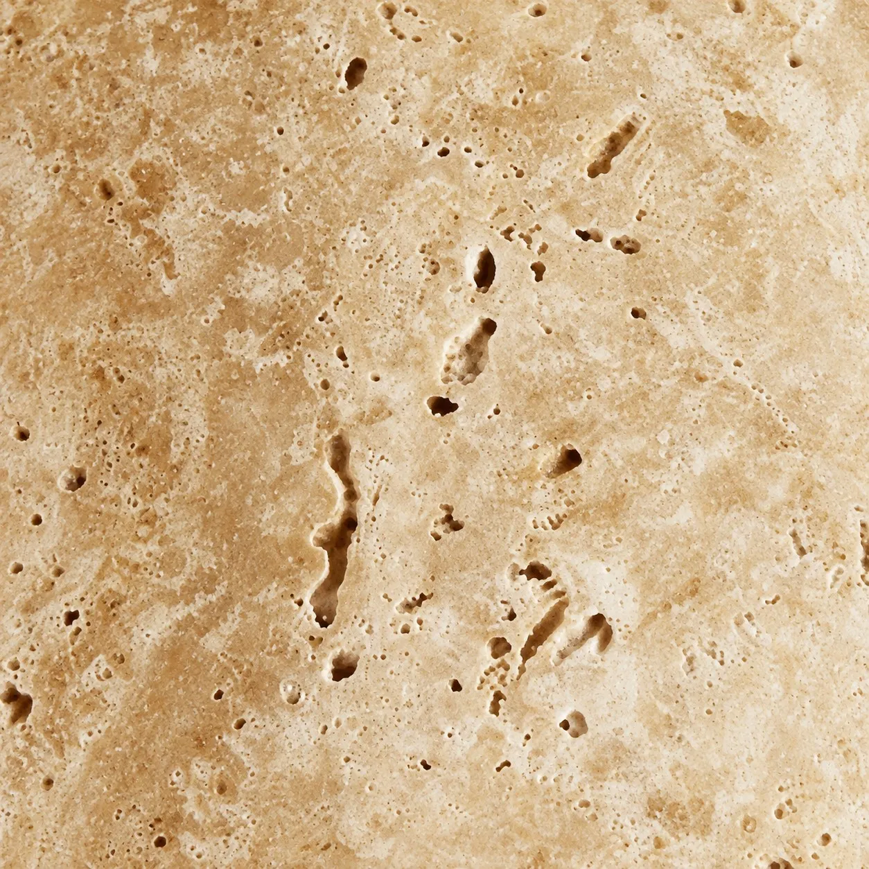 Travertine bowl pendant over a dining table