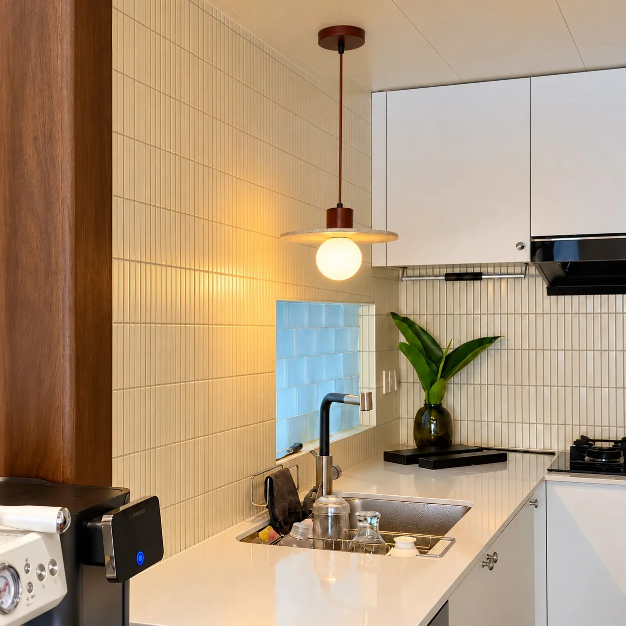 Tapered travertine cylinder pendant in a quiet room