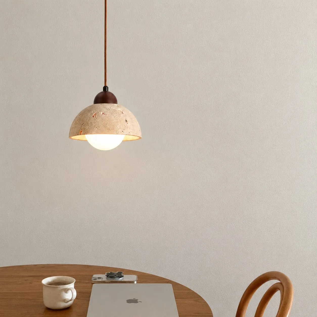 Travertine capsule pendant in a bedroom